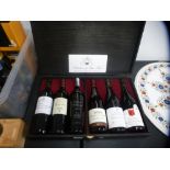 Six bottles of French red wine, various years, in presentation case