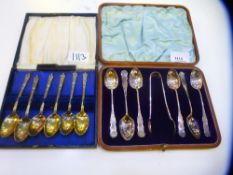 A set of Victorian decorative cased silver teaspoons with sugar tongs included, stamped Sheffield