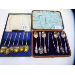 A set of Victorian decorative cased silver teaspoons with sugar tongs included, stamped Sheffield
