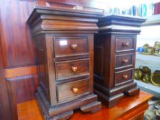 A pair of modern three drawer bedside chests, each 40 cms wide