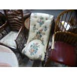 A Victorian rosewood slipper chair, having button back on cabriole legs