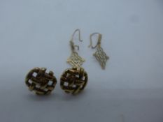 Two pairs of 9ct yellow gold earrings, both marked 375, one a stud and the other a drop style,