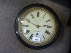 A small Victorian circular wall clock by Sullivan and an American drop dial wall clock