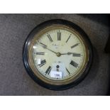 A small Victorian circular wall clock by Sullivan and an American drop dial wall clock