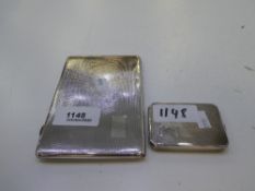 Two silver cigarette cases engine turned silver gilt, one being smaller, one larger. Smaller with