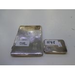 Two silver cigarette cases engine turned silver gilt, one being smaller, one larger. Smaller with