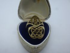 Two 9ct yellow gold rings of Celtic design, both marked 375, size M, one slightly misshapen, total