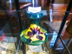 Moorcroft squat candlestick decorated with flowers