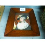 An antique minature portrait of lady wearing hat, 19th century, in rosewood frame, with details on