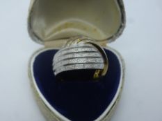 18ct two tone cross over dress ring, set with diamond chips, size R/Q, gross weight approx 10.5g