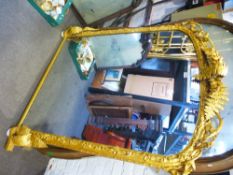 A Victorian gilt overmantel mirror decorated fern and ivy leaves, 130 cms