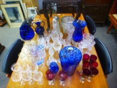 A quantity of coloured and clear glassware