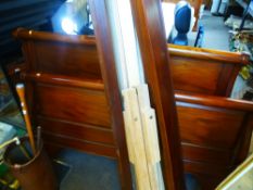 A reproduction mahogany sleigh bed, to take a 5ft mattress