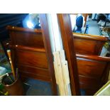 A reproduction mahogany sleigh bed, to take a 5ft mattress