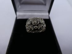 Yellow gold and silver dress ring with floral marcasite panel, size N, 4.5g