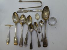 A lot comprising of silver tableware of spoons, tongs etc some Irish silver, continental and