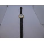 Vintage Rotary Gent's wristwatch with gold case, on brown leather strap