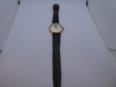 Vintage Rotary Gent's wristwatch with gold case, on brown leather strap