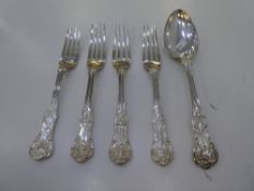 Four heavy silver forks and one silver serving spoon. Forks hallmarked London and Exeter possibly