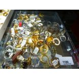 A tray of costume rings and similar