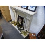A marble style modern fire surround with hearth, width 125cms