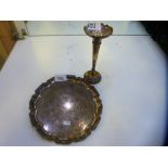 A silver tray plate AF with a silver candlestick. Plate hallmarked Sheffield 1929 Mappin and Webb