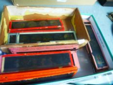 A small quantity of old coloured glass magic lantern slides