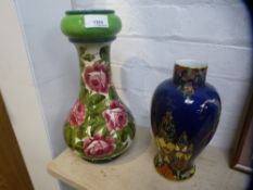 A Wemyss baluster vase, decorated roses, the base stamped 'Made in Scotland for W Rowland and Son,