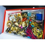 A box file containing costume jewellery