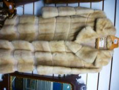 A Harley Parish white fur coat