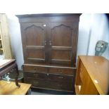 A 19th century oak bacon cupboard, having two long drawers on square leg, 134 cms