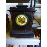 A Victorian slate mantel clock