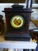 A Victorian slate mantel clock