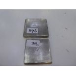 Two silver cigarette cases both engine turned design and silver gilt interior. One being