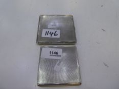 Two silver cigarette cases both engine turned design and silver gilt interior. One being