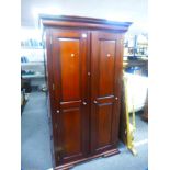 A modern mahogany style two door wardrobe, 111 cms