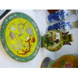 A Chinese yellow plate decorated two dragons, with green edge, 24 cms and a Chinese moonflask