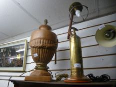 A Grecian style lamp and a lamp in the form of a vintage fire extinguisher