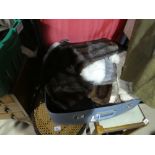 Vintage suitcase of fur stoles a rabbit fur handbag, musquash, etc