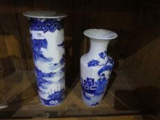 2 blue and white vases of Oriental scenes with markings
