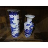 2 blue and white vases of Oriental scenes with markings