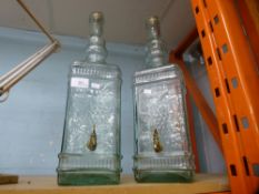 Two glass oil decanters