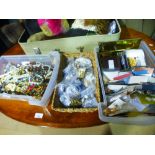 Two trays of vintage costume jewellery and a tray of vintage buttons