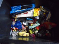 Box of diecast toys