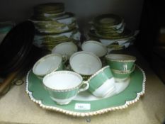 Royal Worcester bone china dinner/tea set, green and gilt decoration