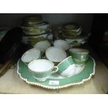 Royal Worcester bone china dinner/tea set, green and gilt decoration