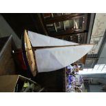 Wooden model of yacht on stand