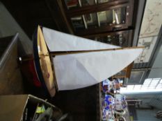 Wooden model of yacht on stand