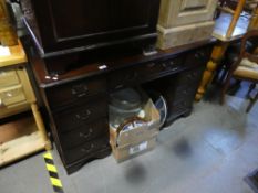 Mahogany pedestal desk with green tooled leather above 9 drawers and matching chest of 4 drawers,