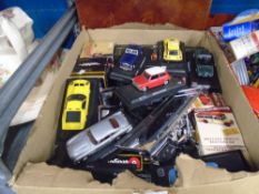 Mixture of model cars including some James Bond ones and a briefcase